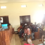 1 childline staff demonstrating hand washing at Busimbi community hall (3)